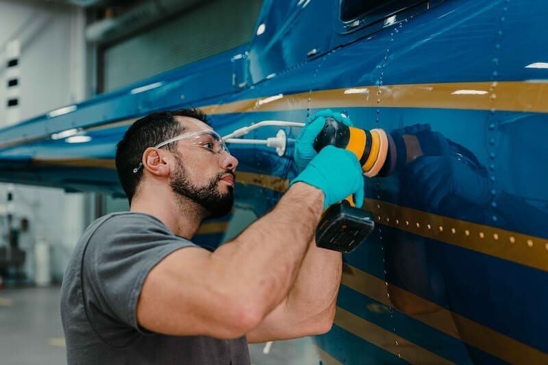 Bell Employee Working on Aircraft